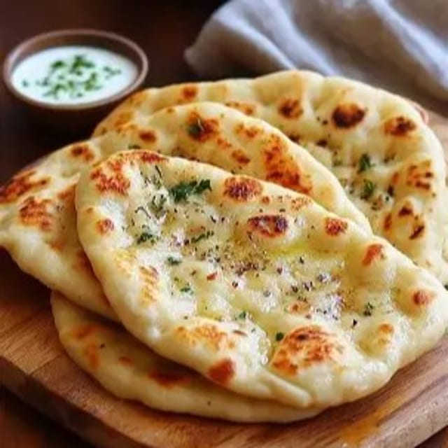 Garlic Naan  (1 piece).