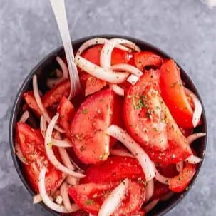 Cut Onions and Tomato Salad.